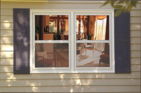 Modern low-E exterior storm windows blend in with the original window and provide a year-round increased comfort and energy efficiency 