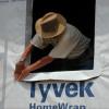 After installing the house wrap over the SIPS, window flashing is installed