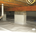 Right - The posts and floor of this crawlspace are covered with a heavy sheet of vapor retarder that is sealed to the post, the walls, and at all seams.
