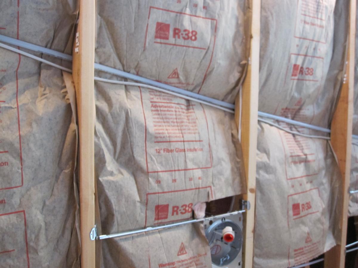 Correctly installed fiberglass batt.