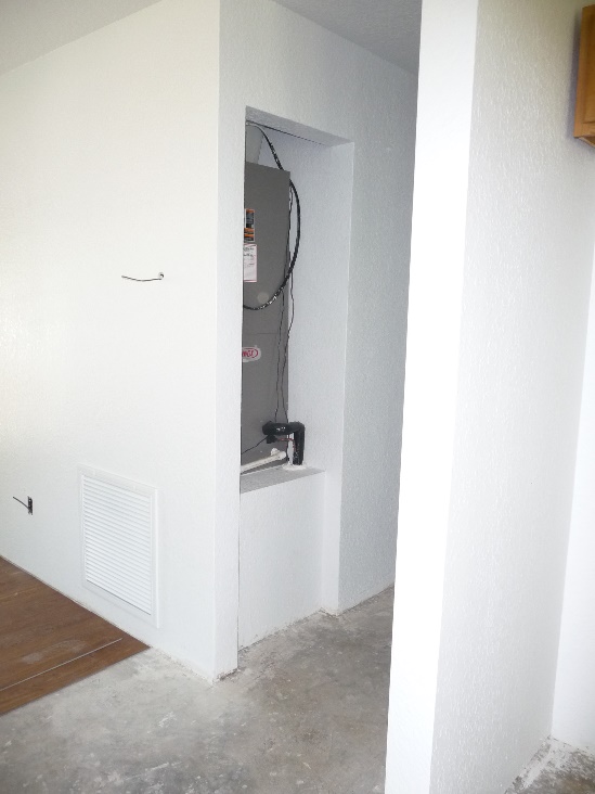 Air handler closet with side entrance return prior to door installation.