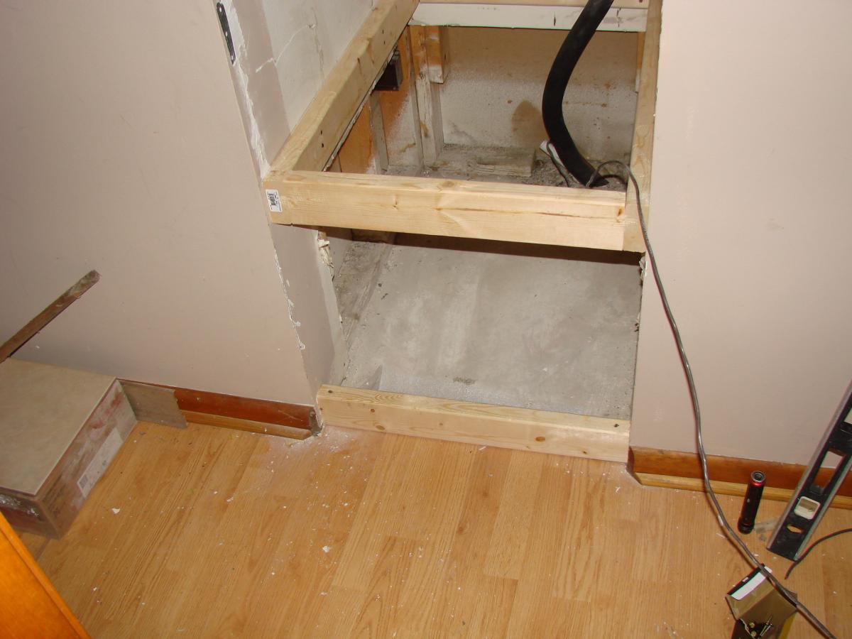 Framing is installed for the platform and filter-backed grille.