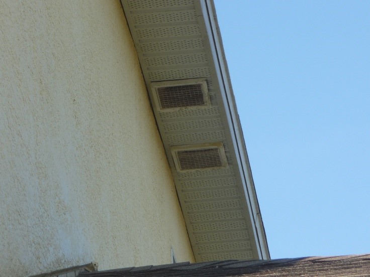 These second-story ventilation air intake/exhaust grilles can be accessed from the lower roof for air-flow testing 
