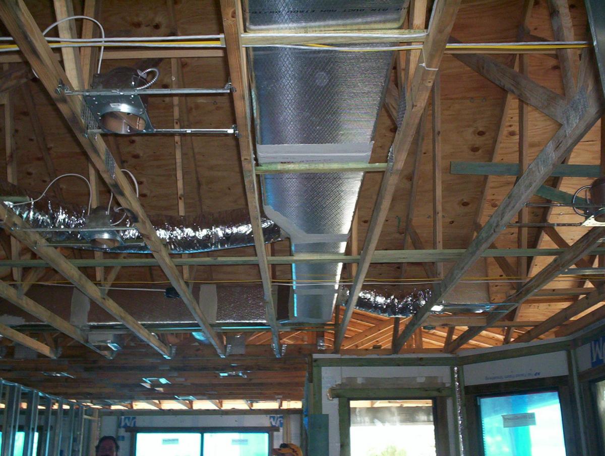 Ducts installed before ceiling.