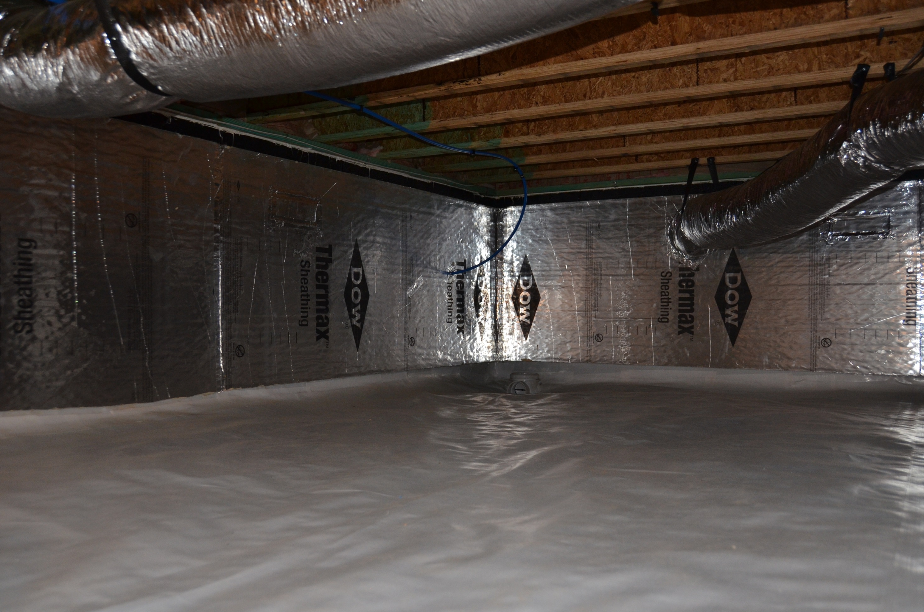 The sealed, insulated crawlspace is a clean, dry location to house the main floor heating ducts and also provides bonus storage space.
