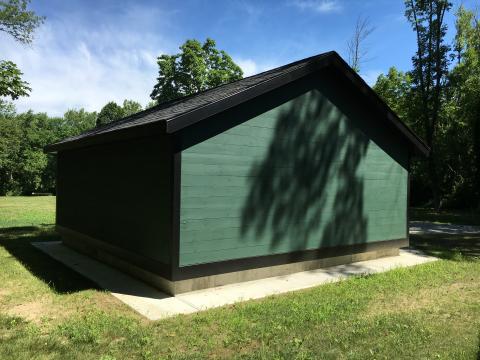 Concrete (4 inches thick at 5% slope) provides a pest-resistant perimeter around the foundation