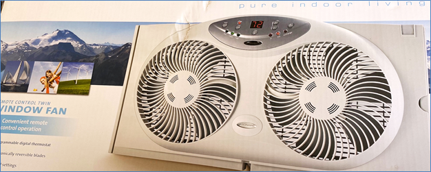 A reversible window fan can operate via thermostatic or remote control and can selectively exhaust air or bring in outdoor air