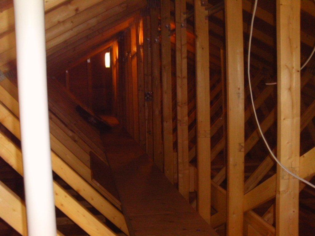 Above the 20 inches of blown cellulose ultraefficient attic insulation, Near Zero Maine