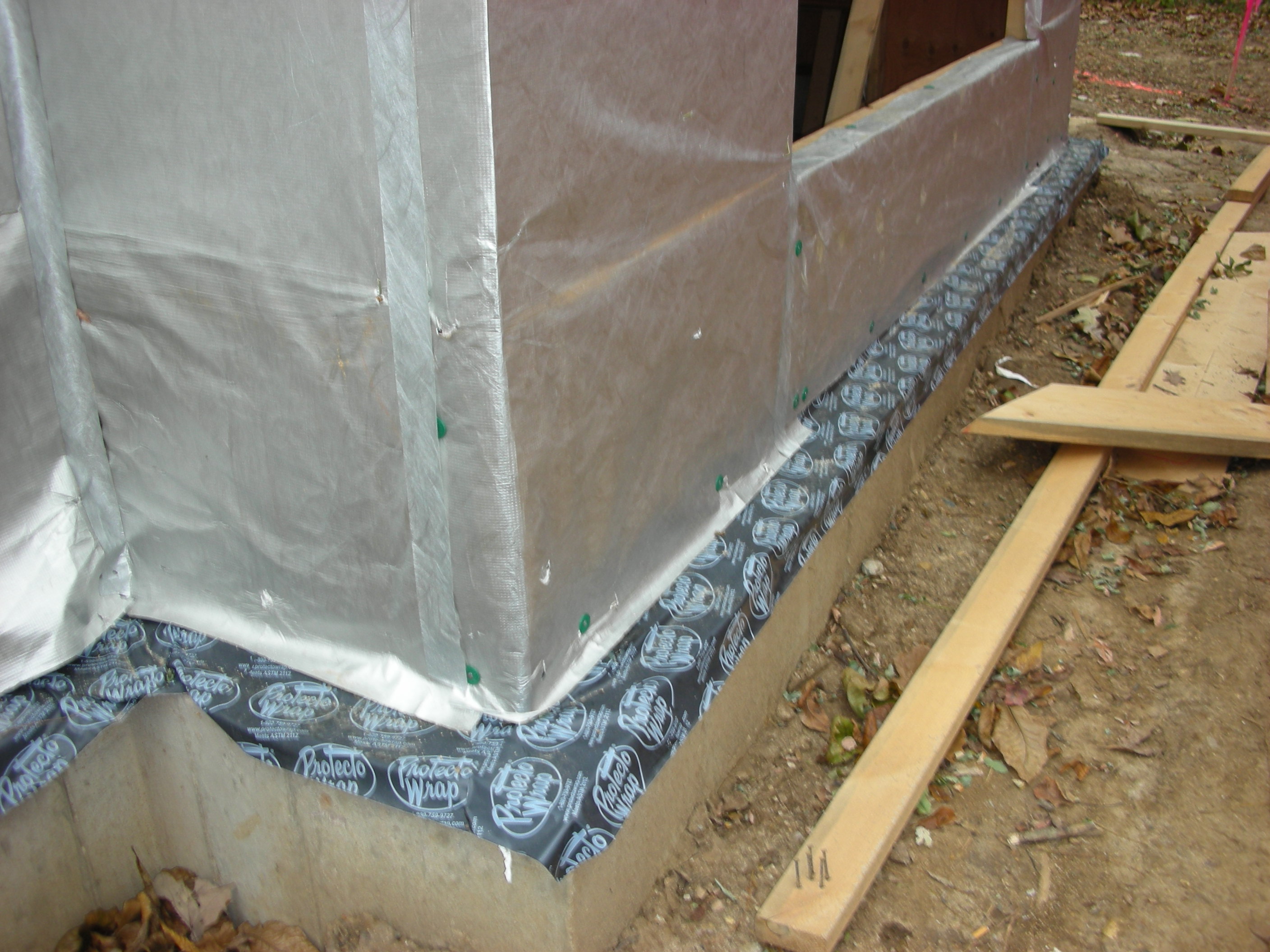 Flexible rubber through-wall flashing.