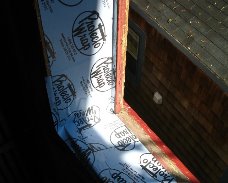 Example of membrane installation in a wood window frame