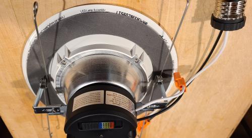 The grey ring around the back of this LED retrofit ceiling fixture trim kits is a foam gasket to air seal the fixture. 