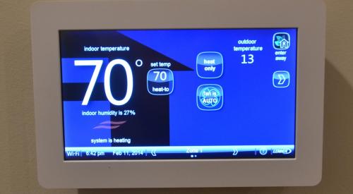 Right - The advanced controls in a programmable thermostat can be used to improve the efficiency of the home’s HVAC system.