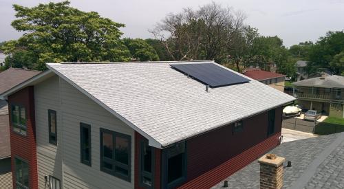 The simple gable roof is constructed at an unusual 6.55 pitch that allows exactly four and a half sheets of 4-foot- wide coated, taped roof sheathing to be installed as the roof deck with enough space at the peak for a continuous ridge vent. 
