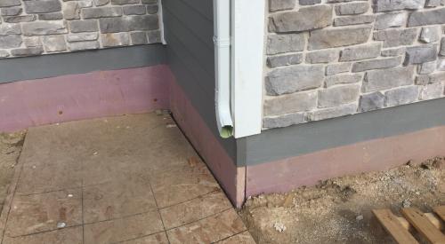 Rigid foam protects the exterior of the foundation.