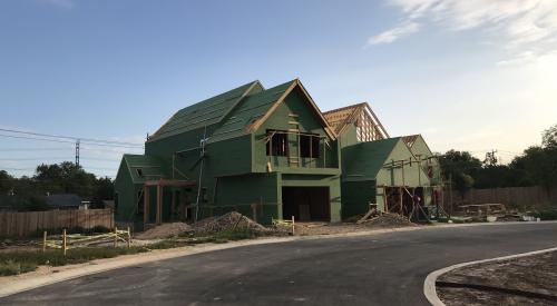 Right – Coated OSB provides a weather-resistant air barrier for this envelope of this home. 