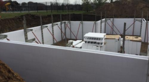 Right – The spacer structure of these ICFs provides supports for attaching the fasteners used to attach the metal studs of the below-grade walls. 