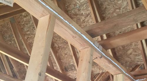 Right – A bead of sealant will form an airtight gasket between the top plate and drywall.
