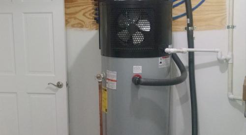 Right – Hot water from this heat pump water heater is distributed efficiently to each hot water use in the home through a central manifold via PEX piping.