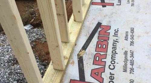 Right – Staggered 2x4s are placed every 12 inches on 2x6 plates, providing a nailing surface on each side of the wall every 24 inches.