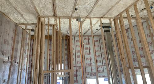 Right – Spray foam fills the cathedral ceilings of the home.