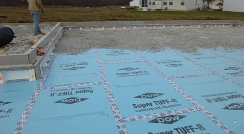 Right – After installing the insulated concrete foundation wall panels, the builder installed underslab rigid foam, which was topped by 4 inches of crushed rock then the poured slab.