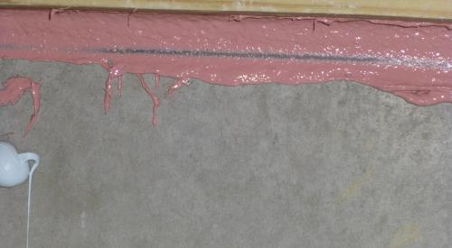 Right – The joint between the foundation wall and the mud sill is thoroughly sealed with a liquid-applied sealant.