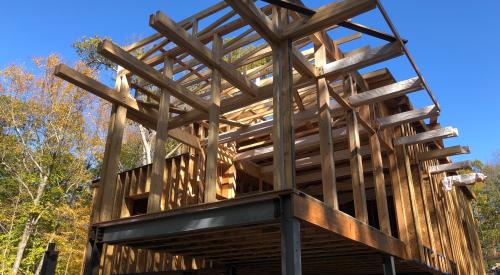 Ceiling joists extend out to provide very strong roof overhangs that will resist uplift pressures in high winds. 