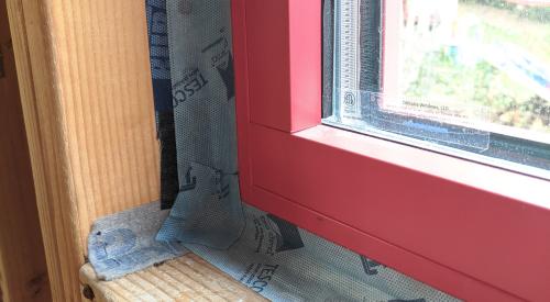 Right – Interior wood-to-wood seams around a window are sealed with tape to prevent air leakage. 