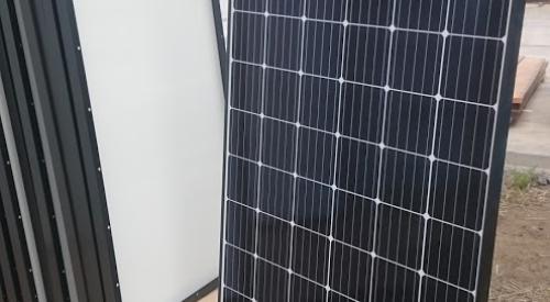 Right – Photovoltaic solar panels are ready for installation on the roof of a DOE Zero Energy Ready certified home. 