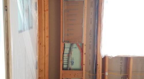Right – Wiring holes in the exterior walls are sealed with canned spray foam to prevent air leakage into or out of the home.
