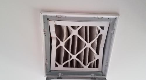 Wrong - Air filter was compressed and may not function effectively to filter return air.