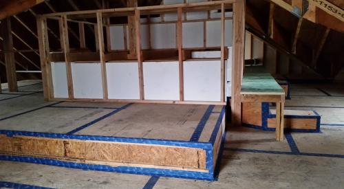 Air sealing tape seals all wood-to-wood joints in the attic.