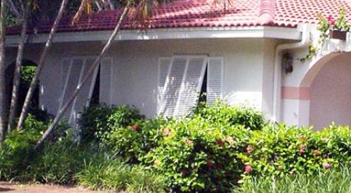 Exterior shading devices such as these Bahama shutters can significantly increase the hours of safety provided by a home during an extreme heat event. 