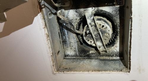After cleaning the exhaust fan, the gap around the fan between the fan housing and the drywall should be caulked to stop air leakage from the house to the attic