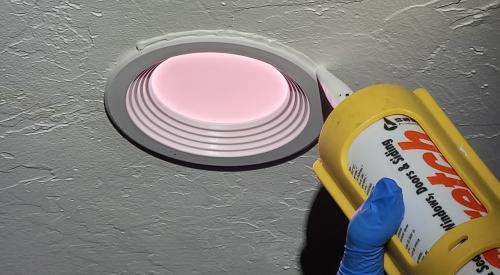 Caulk around recessed can and new LED retrofit ceiling light kits to complete the air seal.
