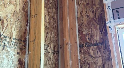 All wall cavities in this exterior wall were air sealed by caulking the sheathing to the frame and caulking the joints between framing members