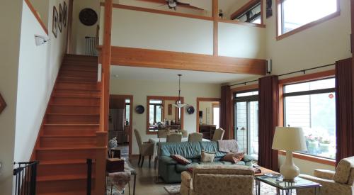 Thermal mass stained concrete slab absorb solar heat during the day and release it into the rooms at night.