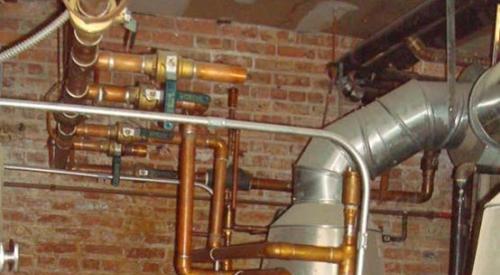 These copper plumbing pipes should be insulated. 