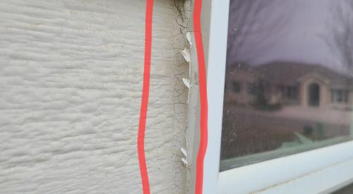 The exterior caulking around this window is clearly cracked, indicating that the caulking is no longer performing well and should be replaced.