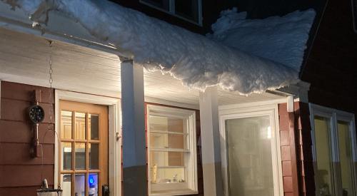 Snow and ice buildup over doorways can be a source of injury for occupants.