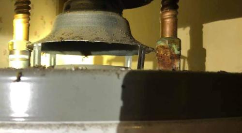 This gas water heater flue pipe is disconnected; this is a dangerous situation allowing carbon monoxide and other combustion emissions to escape into the home; call a plumber to make repairs as soon as possible 