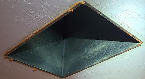 The gaps around this duct boot are sealed with canned spray foam.