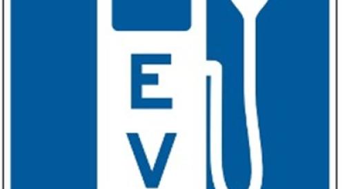 Signage can help drivers locate EV charging spaces.