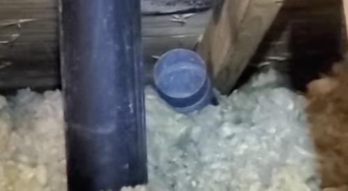 This exhaust fan duct opens into the attic rather than exiting through the roof and mold has begun to form on the underside of the deck sheathing and on the rafter due to the moist air exiting the duct