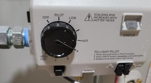 Before conducting a blower door test, turn off any ambient gas water heater located in the conditioned space of the home; when the test is finished, turn the water heater back on and reset the pilot light if needed.