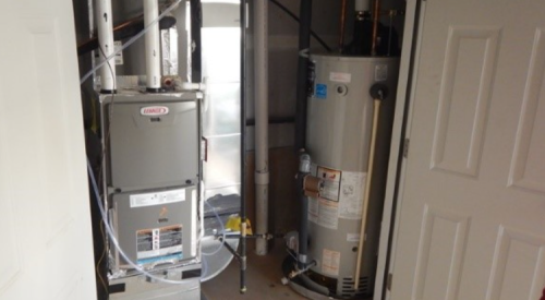 HVAC equipment should never be exposed to the garage; instead, locate them in air-sealed closets, with weatherstripping, spring-loaded hinges, and mastic.