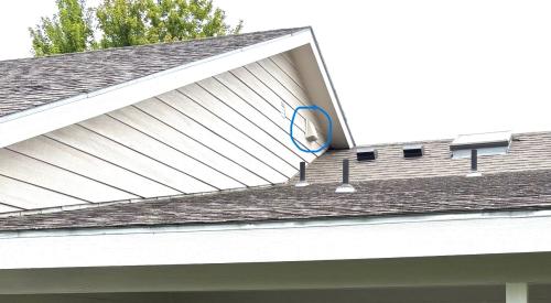 There is an exhaust duct visible in the exterior wall above the microwave exhaust fan