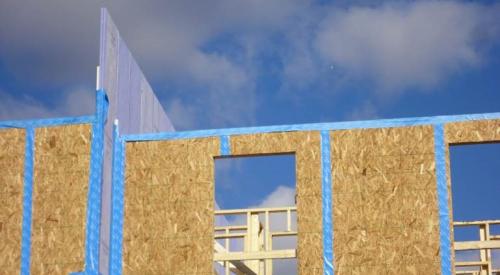 The party wall interfaces of this multifamily building are sealed with air-sealing tape