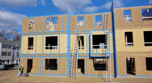 All of the sheathing seams and joints in the exterior walls of this multifamily building are air sealed with tape including the seams at the party wall interfaces