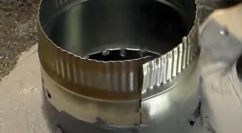 After connecting with sheet metal screws, this take-off collar is then air sealed and further secured using UL 181 fiber-reinforced duct sealant mastic paste.